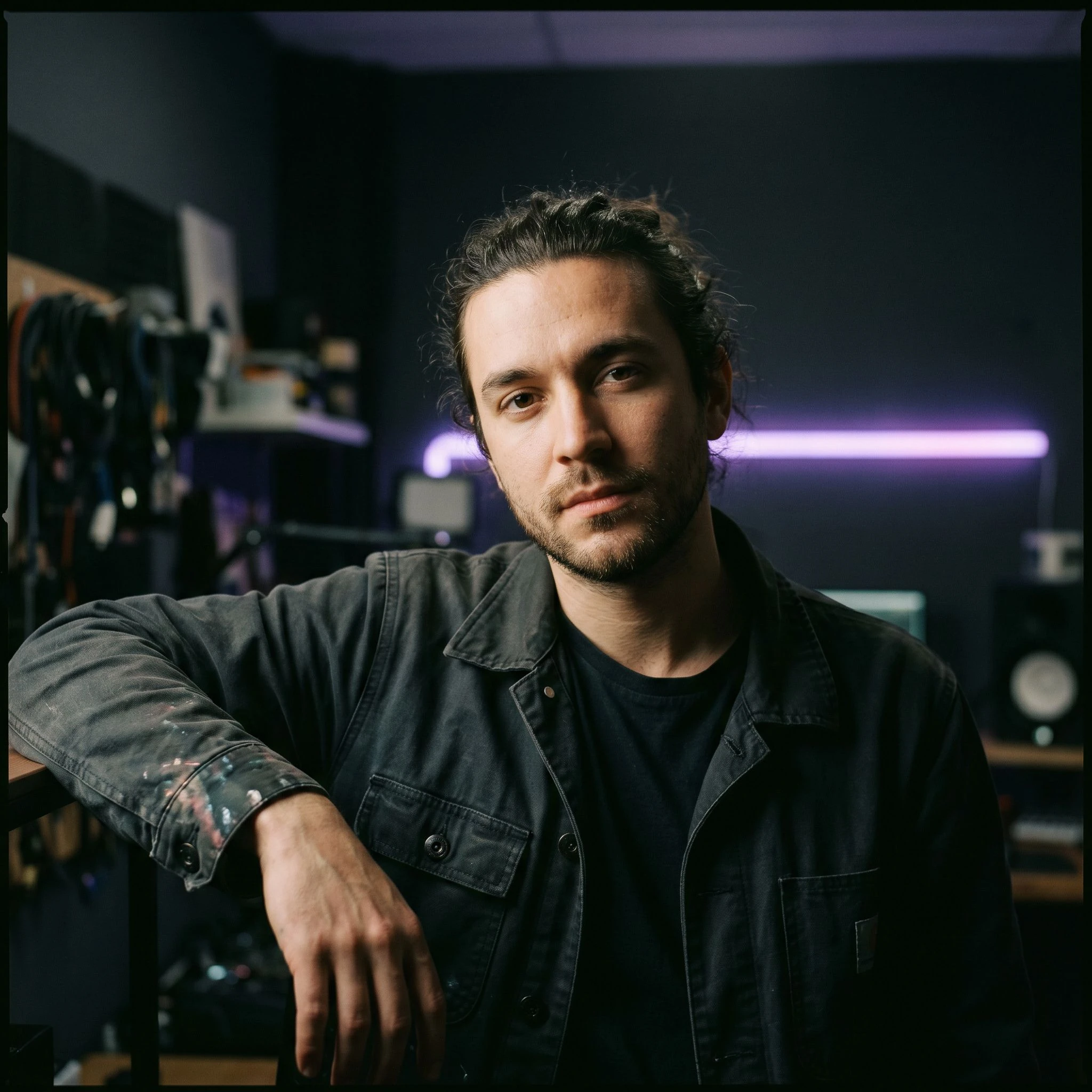 Editorial portrait of a younger creative professional in a studio setting